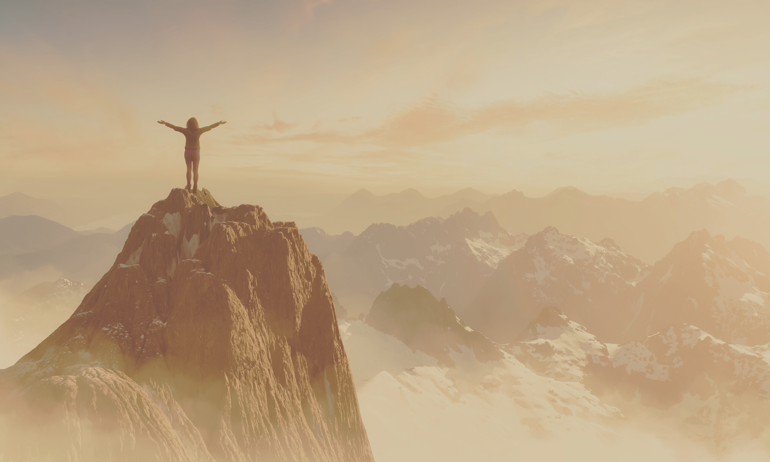 Woman standing on a mountaintop